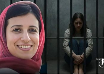 Hoda Mehrganfar, political prisoner in Adelabad Prison, Shiraz, endures indefinite detention, denied medical care for a severe cyst, facing white torture. Act now.
