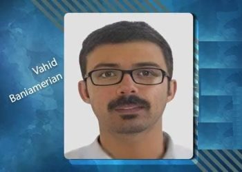 Vahid Bani Amerian, a political prisoner in Iran, faces a death sentence after severe torture and unfair trials. Learn about his case and human rights concerns.