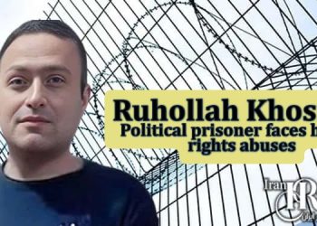Ruhollah Khosravi, a political prisoner in Dezful Prison, faces human rights abuses, no trial, and a 60 billion toman bail. Demand justice for his arbitrary detention.