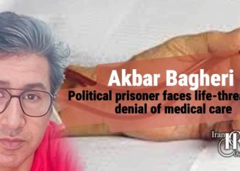 Akbar Bagheri political prisoner faces life-threatening denial of medical care in Qezel Hesar Prison. Authorities ignore his severe health issues for over two months, risking irreversible harm.