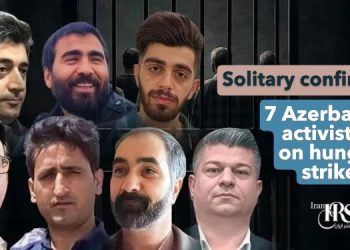 Iran transfers 7 Azerbaijani activists to solitary confinement in Evin Prison over hunger strike. Punitive action highlights medical neglect and discrimination fears.